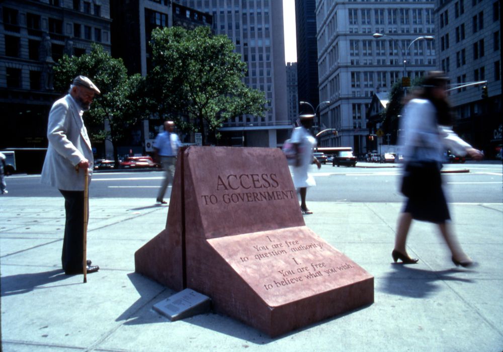 William Fulbrecht, Bill of Rights: Access to Government, 1990, Foley Square, Manhattan, Photo by Tim Karr, A Project of the Public Art Fund. Fulbrecht’s Bill of Rights project coincided with the 200th anniversary of the passage of the first 10 amendments to the United States Constitution. He cast colored concrete markers inscribed with text referring to the amendments and Supreme Court interpretations over time, making a powerful statement about the foundation and fragility of our liberties.<br/>